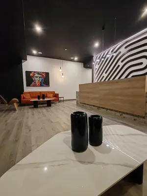 a living room with a table and a couch at Beautiful view in San José