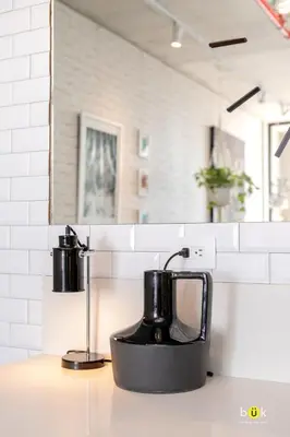 a black tea kettle on a counter in a kitchen at ART AND STYLE Wonderful space for a couple in San José