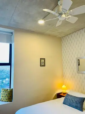 a bedroom with a ceiling fan and a bed at Charming 3BR in Trendy Neighborhood in San José
