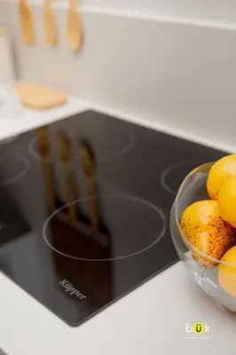 a bowl of fruit sitting on a kitchen counter at Cozy New Studio Excellent Location in San José