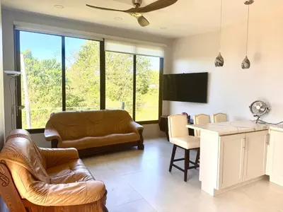 a living room with a couch and a table at Casa Dorada 55 Studio in Marbella
