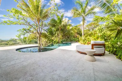 an image of a villa with a swimming pool at Casa Vivo in Nosara