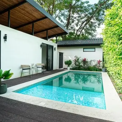 Tropical 4BR Retreat with Private Pool Guest House