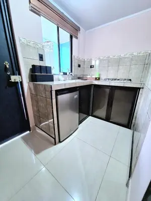 a kitchen with a sink and a counter top at Apartamento Studio cerca de Playa Tamarindo in Villarreal