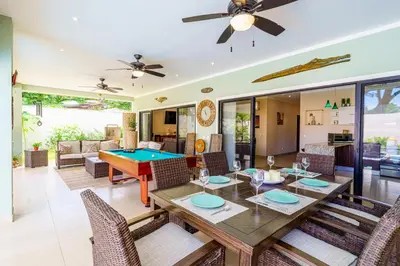 a dining room with a ping pong table at Casa Mimi - Beautiful House In Surfside in Potrero