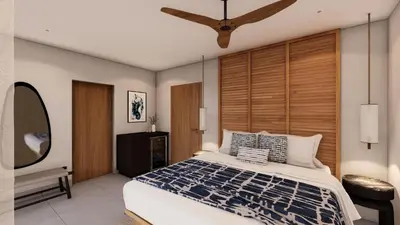 a bedroom with a bed and a ceiling fan at Royal Grand Resorts - Where guys come to play! Exclusively for men! in Manuel Antonio