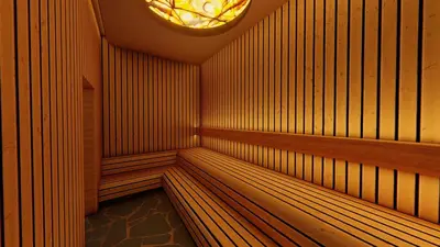 a wooden sauna with a light on the ceiling at Royal Grand Resorts - Where guys come to play! Exclusively for men! in Manuel Antonio