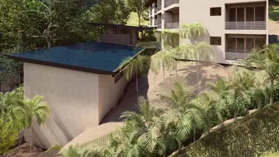 a building with a blue roof and palm trees at Royal Grand Resorts - Where guys come to play! Exclusively for men! in Manuel Antonio