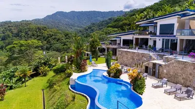 an aerial view of a house with a swimming pool at Unique panoramic view and Central location! in Uvita