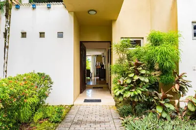 a hallway of a house with plants at Unique panoramic view and Central location! in Uvita