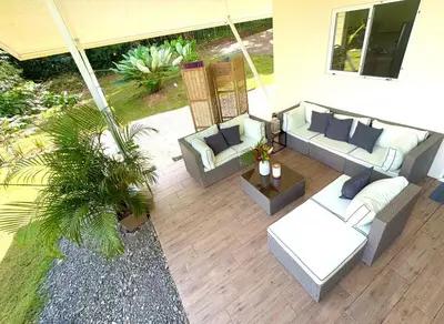 an aerial view of a patio with couches and a table at Paradiselodge - Casa Linda in Platanillo