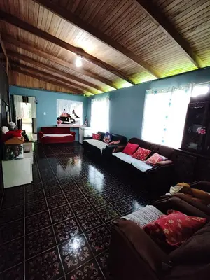 a large living room with couches and a table at Casa La Esperanza in Chachagua