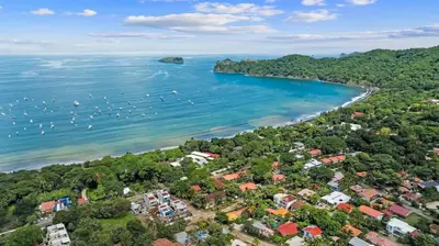 an aerial view of a beach with boats in the water at Chic Bohemian Villa with a Private Swimming Pool and Stunning Outdoor Space in Coco