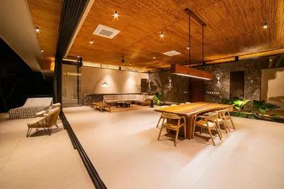 a large room with a wooden table and chairs at Casa Lagom, Luxurious Oasis with Infinity Pool! in La Cruz
