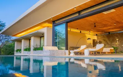 an image of a house with a swimming pool at Casa Lagom, Luxurious Oasis with Infinity Pool! in La Cruz