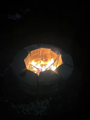 a soccer ball with a fire in the dark at Skyline Great View in Naranjo