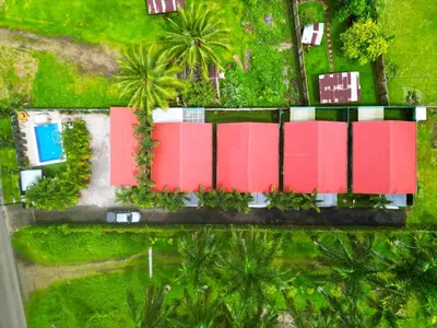 an overhead view of a building with red and white at Hormiga's Houses La Fortuna in Fortuna