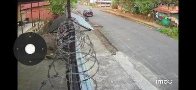 a bunch of wires on a pole on a street at En-suite Paraiso #1 in Parrita