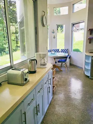 a kitchen with a counter with a toaster on it at Casa Ballena with Beach Access and Private Pool in Uvita