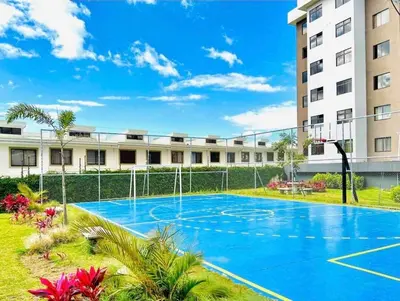 an empty basketball court in front of a building at Moderno apartamento en San Jose CR in San José