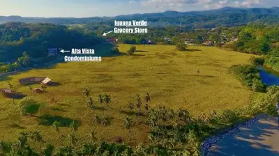 an aerial view of a grassy field next to a river at Catalina World Class Viewslocationservice! in Sámara