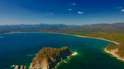 an island in the middle of a large body of water at Catalina World Class Viewslocationservice! in Sámara