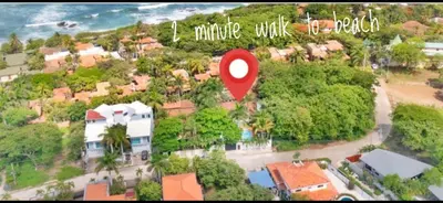 a rendering of a house with a red circle at Main Villa plus 2 casitas, 5 BR, POOL, canaba w grill in Tamarindo
