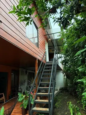 a metal staircase leading up to a house at Estancia Rincón Verde in Fortuna