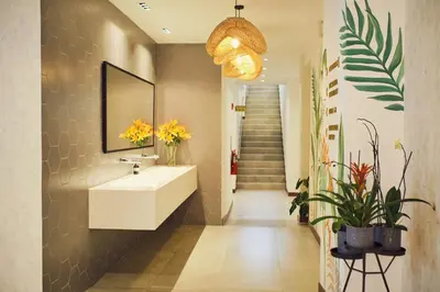 a bathroom with a sink and a mirror at Ocotea Boutique Hotel in Monteverde Costa Rica
