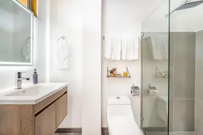 a bathroom with a sink toilet and a shower at Macondo Ecolodge in Coco