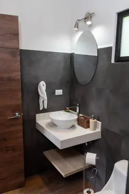a bathroom with a sink and a mirror at Casa Micelio in Monteverde Costa Rica