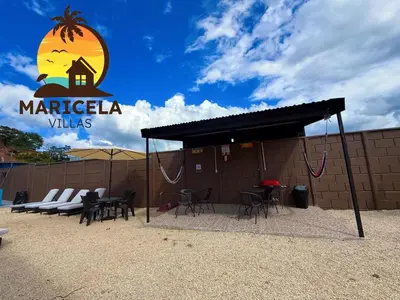 a building with a sign that reads marketilla villas at Villas Maricela Guanacaste in Chorro