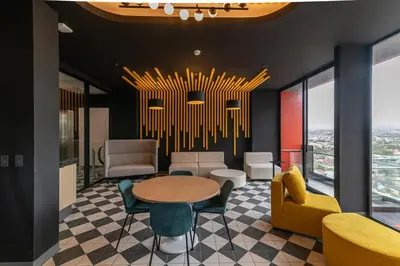 a dining room with a table and chairs at Apartamento Bo Escalante 803 in San José