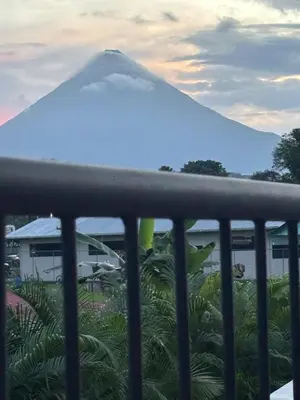 a view of a mountain from a balcony at Sweet Dreams the Arenal in Fortuna