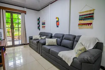 a living room with a large couch at Rustic Ranch in Fortuna
