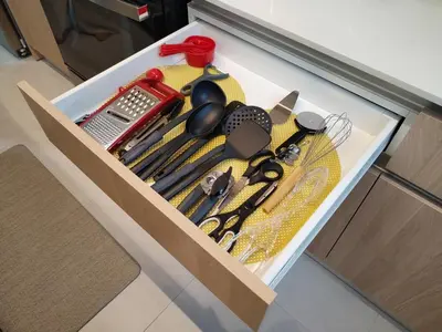 a box full of kitchen utensils on a table at Stylish 2 bed and 2 bath condo with mountain and pool view in Jacó in Jacó
