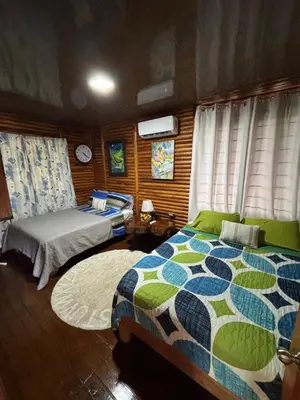 a bedroom with two beds in a boat at Cabin in the wood in San Francisco