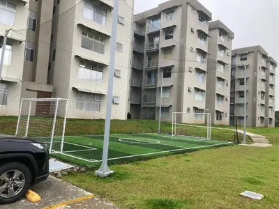 a basketball court in front of an apartment building at 2 BR Condo near San Jose, Costa Rica in Santa Cruz