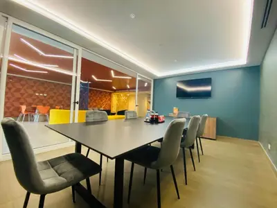 a dining room with a table and chairs at Premium Apartment In Be Cariari in Heredia
