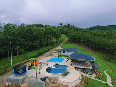 an aerial view of a water park with a playground at Casa Brisa house in the mountains 15 minutes from the beach in Nicoya