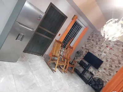 an overhead view of a living room with a wooden chair at La Fortuna, Fluca House 2 in Fortuna
