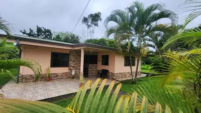 a small house in the middle of a garden at La Fortuna, Fluca House 3 in Fortuna