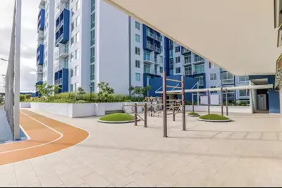 a building with a playground in front of it at Luxury 12th Floor Apartment with Views - Downtown San Jose Pool and Gym in San José