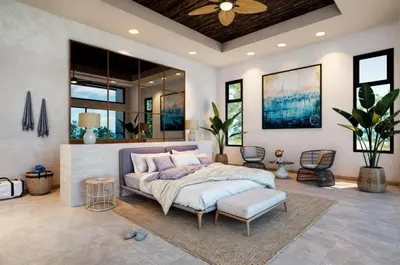 a bedroom with a bed and a couch and windows at Casa Grande Caletas in Jacó