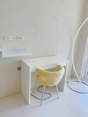 a white desk with a yellow chair and two mirrors at Casa Blanca #1 Beautiful modern beach house in Sámara