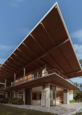 a modern house with a large roof at Casa Solomia Luxury Oceanview 5 min to the Beach in Mal País