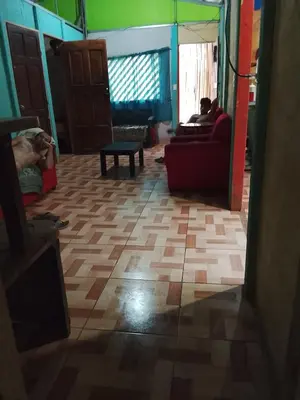 a living room with a couch and a table at Casa Victoria in Ojochal