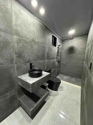 a bathroom with a sink and a toilet at Poás Natural in Alajuela City