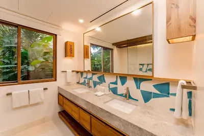 a bathroom with a sink and a mirror at Villa Tortuga in Nacascolo