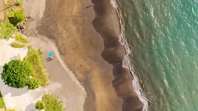 an overhead view of the beach and the ocean at Sol Pacífico at Naumi, Ocean Views & Beach Club in Sardinal